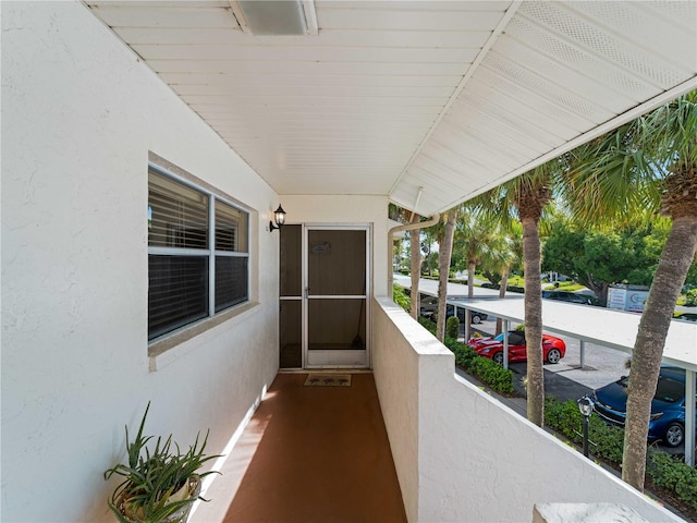 view of patio featuring a balcony