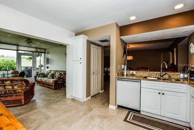 kitchen featuring white cabinets, french doors, dishwasher, and sink