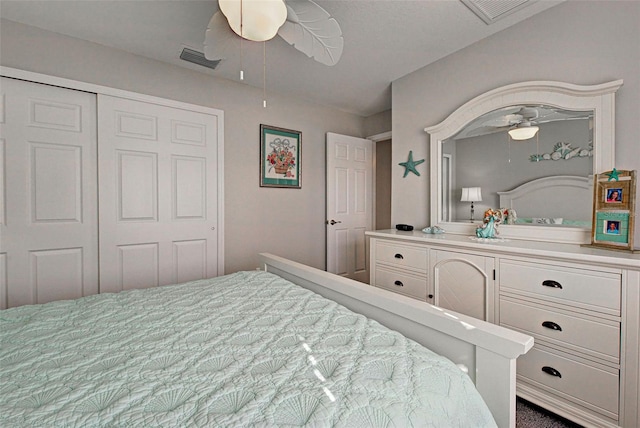 bedroom featuring ceiling fan and a closet