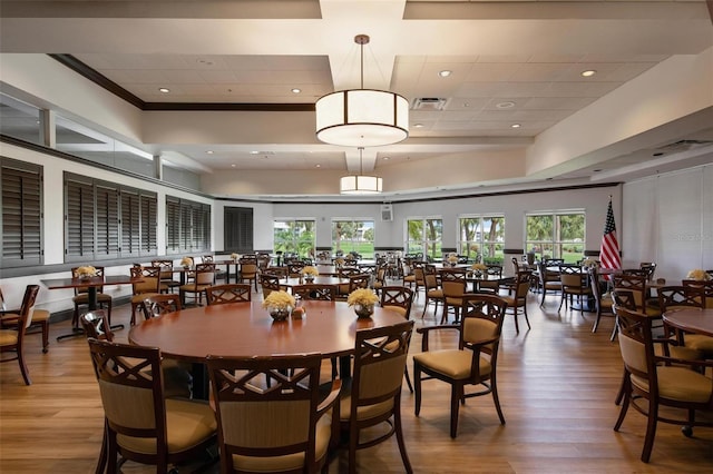 dining area with hardwood / wood-style floors