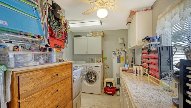 laundry room with washer and clothes dryer, electric water heater, cabinets, and ceiling fan