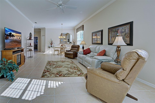 tiled living room featuring ceiling fan with notable chandelier and ornamental molding