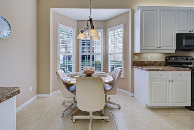 dining room with light tile patterned floors