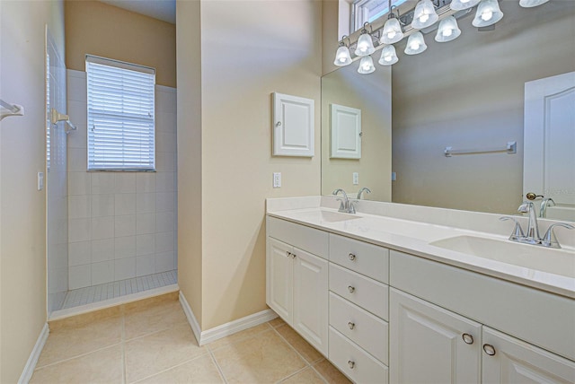 bathroom featuring tile patterned flooring and vanity