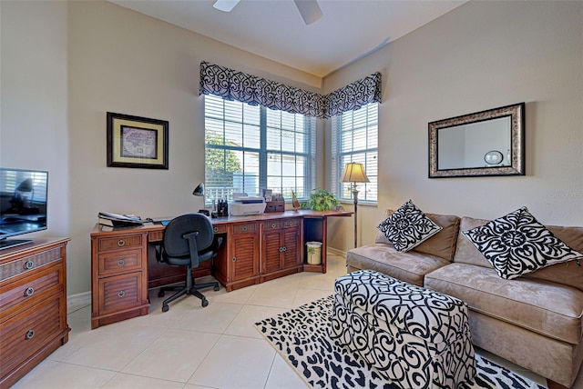 tiled office space with ceiling fan