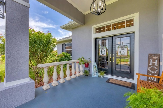 property entrance featuring a porch