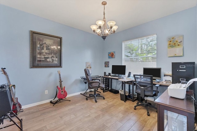 office space with a notable chandelier and light hardwood / wood-style floors