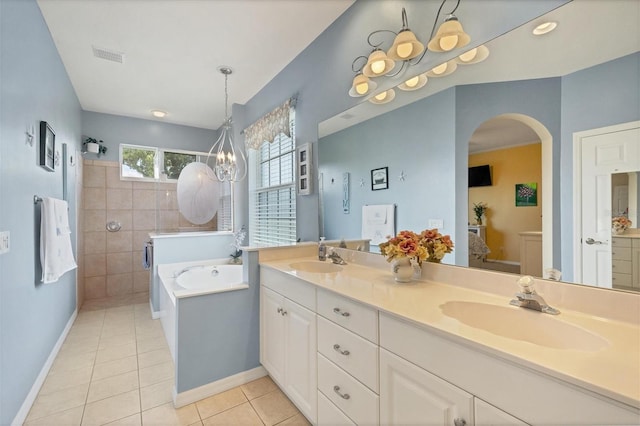 bathroom with independent shower and bath, tile patterned flooring, vanity, and a chandelier