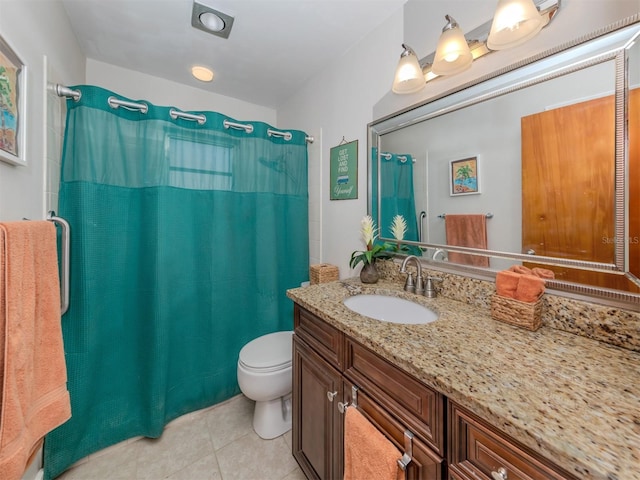 bathroom with vanity, a shower with shower curtain, toilet, and tile patterned flooring