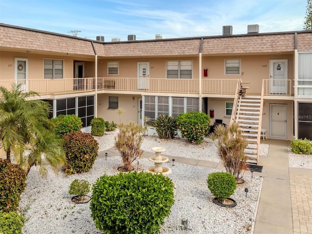 exterior space featuring a balcony