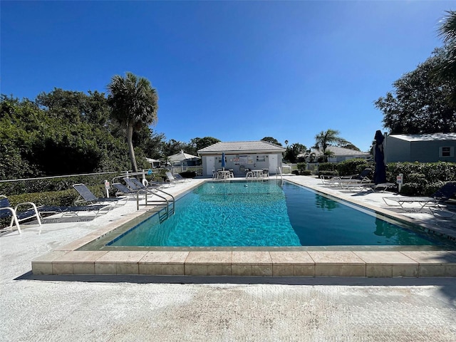 view of pool featuring a patio