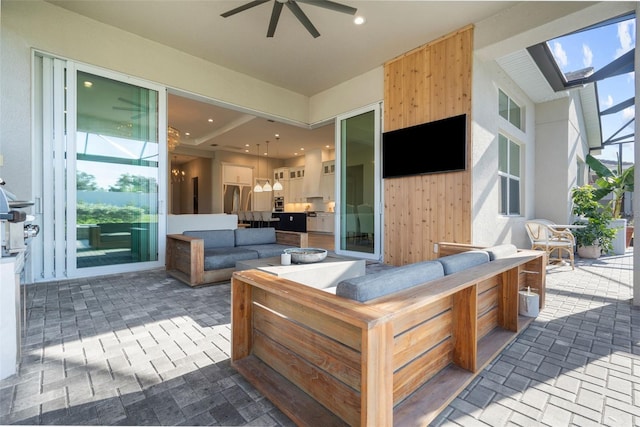 view of patio featuring ceiling fan