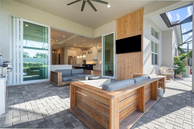 8209 Redonda Loop, Lakewood Ranch, FL 34202 - view of patio / terrace with glass enclosure, an outdoor hangout area, and a ceiling fan