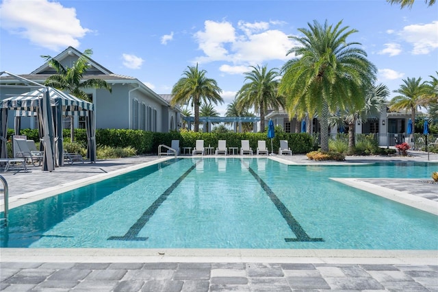 view of pool featuring a patio