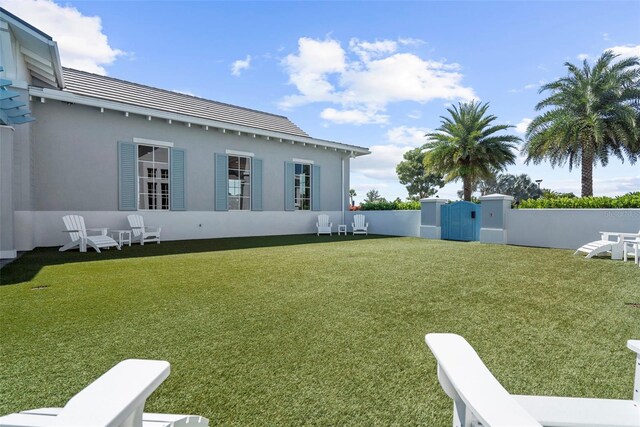 8209 Redonda Loop, Lakewood Ranch, FL 34202 - view of yard featuring a gate and fence
