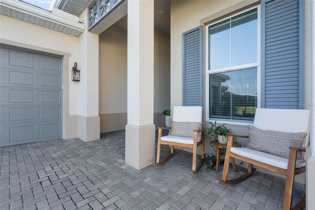 doorway to property featuring a garage