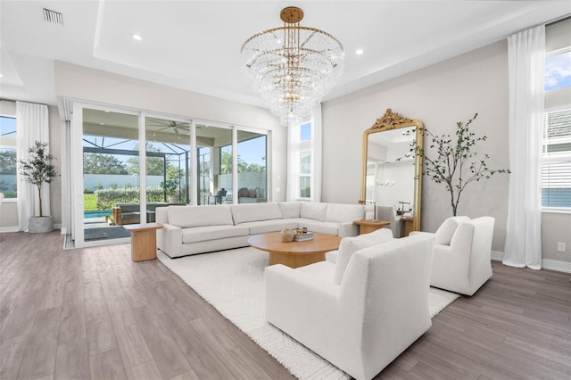 living room with hardwood / wood-style floors and a wealth of natural light