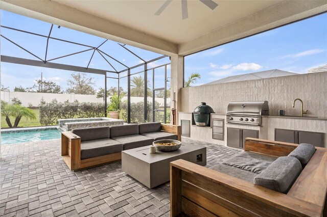 8209 Redonda Loop, Lakewood Ranch, FL 34202 - view of patio featuring a lanai, grilling area, a sink, area for grilling, and a jacuzzi