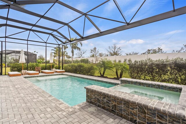 8209 Redonda Loop, Lakewood Ranch, FL 34202 - outdoor pool featuring an in ground hot tub, a lanai, and a patio