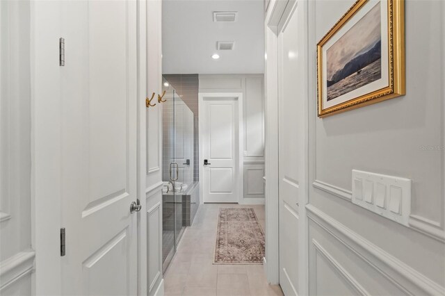 8209 Redonda Loop, Lakewood Ranch, FL 34202 - hall featuring visible vents, recessed lighting, and light tile patterned floors