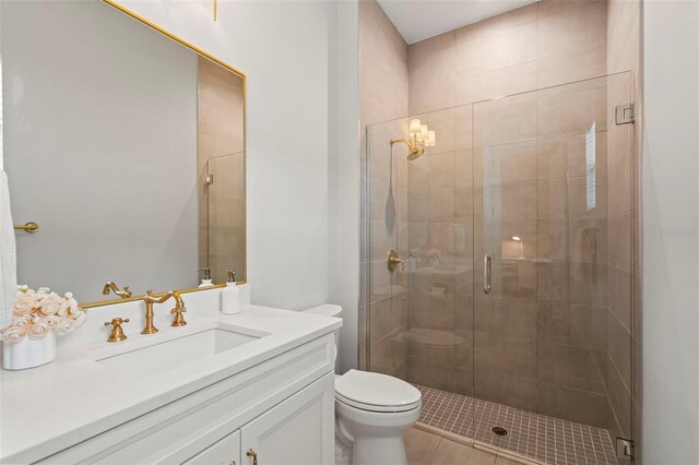 8209 Redonda Loop, Lakewood Ranch, FL 34202 - bathroom featuring toilet, vanity, and a shower stall
