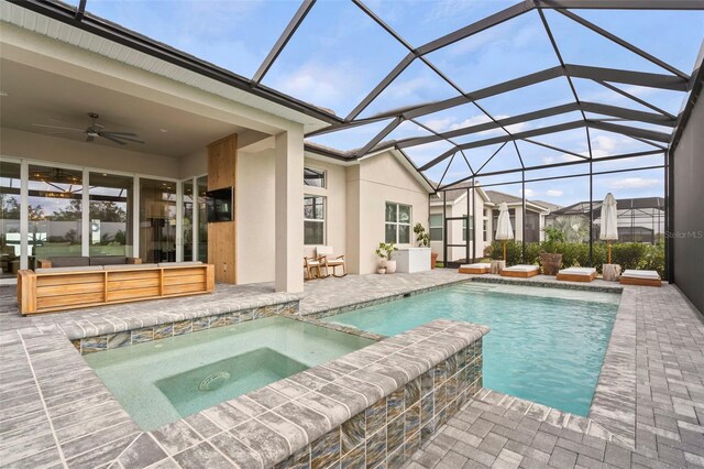 8209 Redonda Loop, Lakewood Ranch, FL 34202 - outdoor pool with glass enclosure, an in ground hot tub, a patio, and a ceiling fan