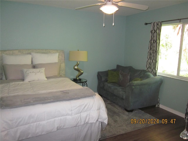 bedroom featuring wood-type flooring and ceiling fan