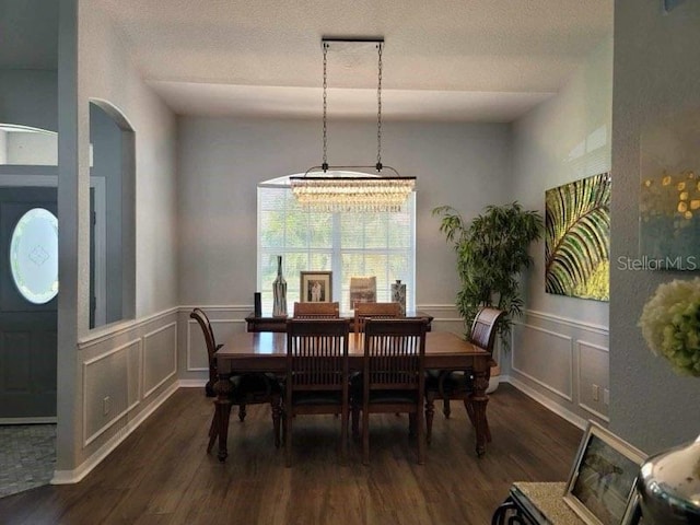 dining room with dark wood-type flooring