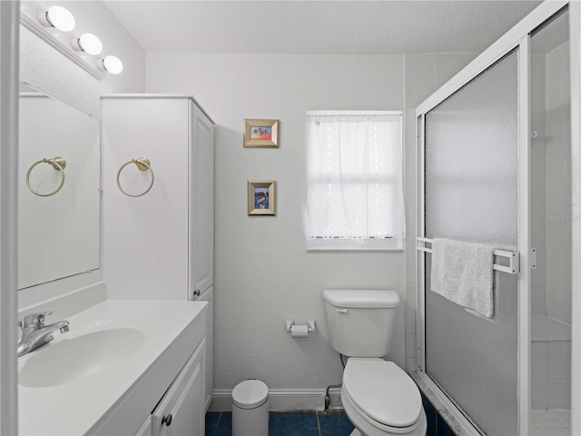 bathroom featuring walk in shower, vanity, and toilet