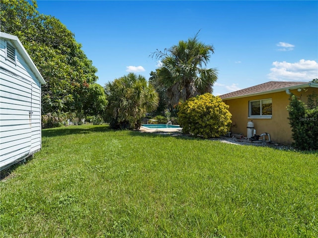424 Baycrest Dr, Venice, FL 34285 - view of green lawn with an outdoor pool