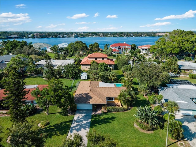 drone / aerial view with a water view