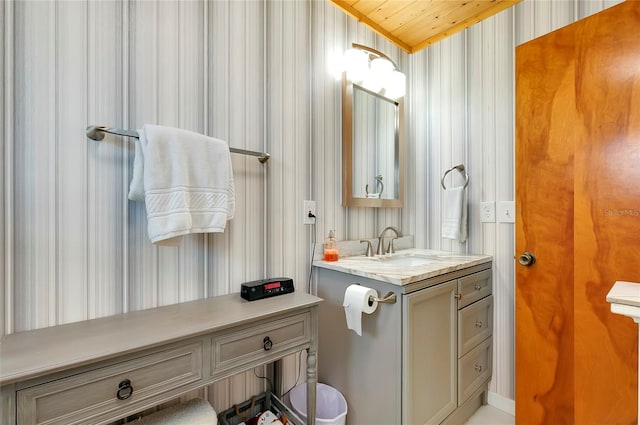 bathroom with vanity and wooden ceiling