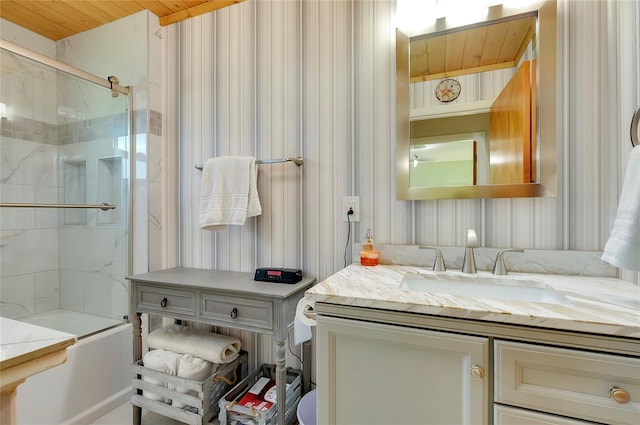 bathroom with vanity, wood ceiling, and enclosed tub / shower combo