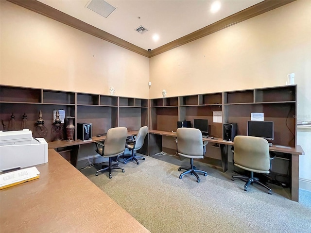 office area with ornamental molding, a towering ceiling, and carpet flooring