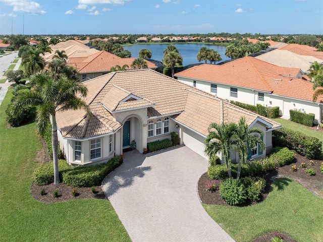 bird's eye view with a water view