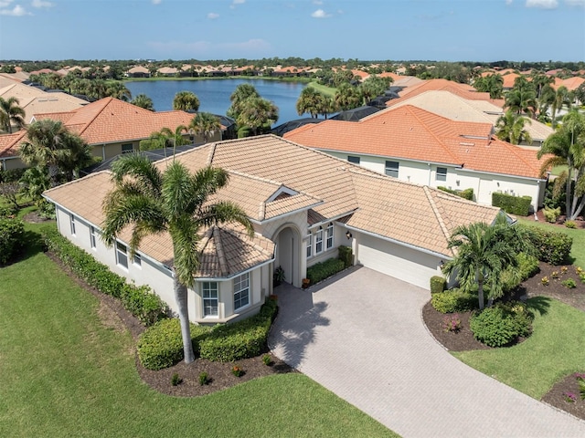 drone / aerial view with a water view