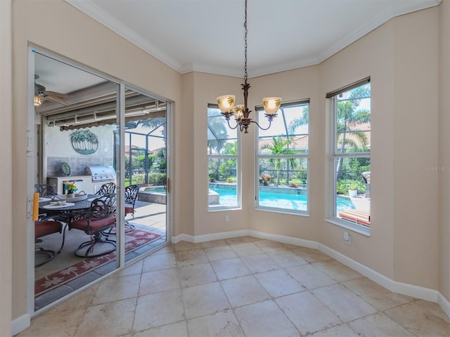 dining area featuring crown molding and ceiling fan with notable chandelier