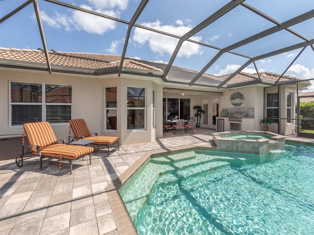 view of swimming pool with a grill, a lanai, an in ground hot tub, and a patio