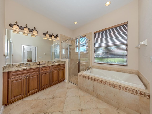 bathroom with vanity and plus walk in shower