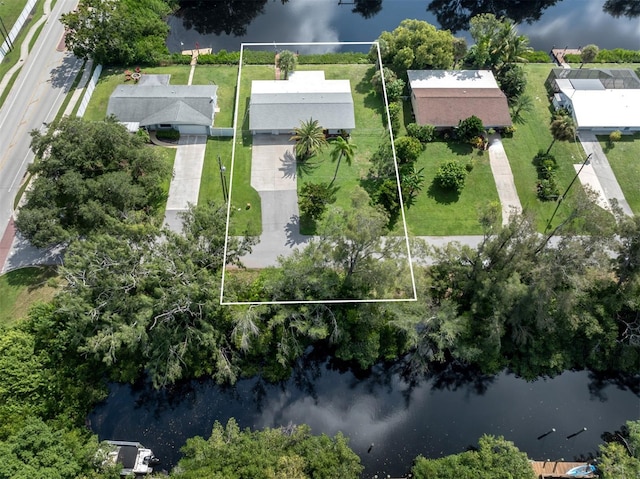 birds eye view of property featuring a water view