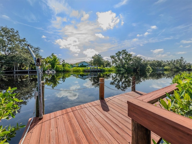 view of dock with a water view