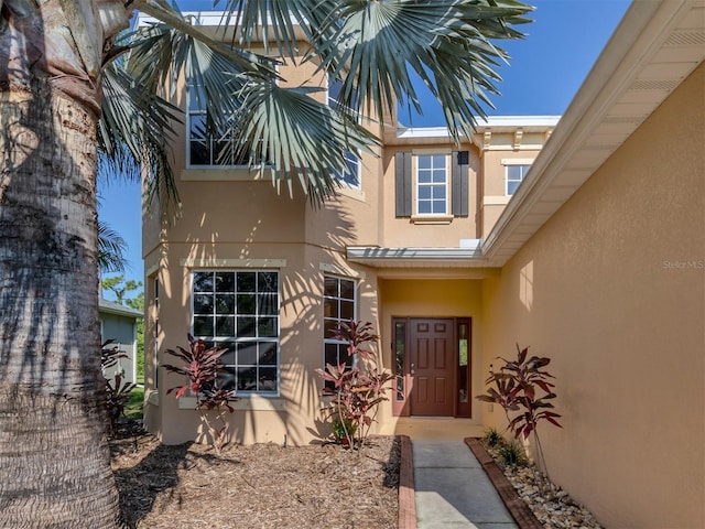 2585 Hobblebrush Dr, North Port, FL 34289 - view of exterior entry with stucco siding