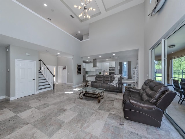 2585 Hobblebrush Dr, North Port, FL 34289 - living area featuring an inviting chandelier, baseboards, stairway, and visible vents