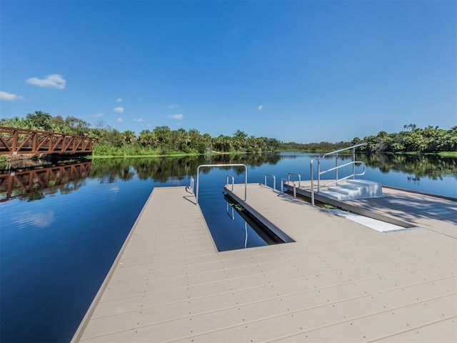 view of dock with a water view