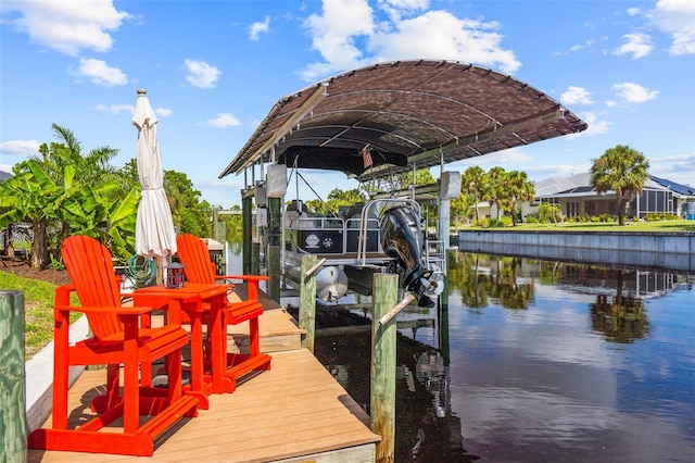 dock area with a water view