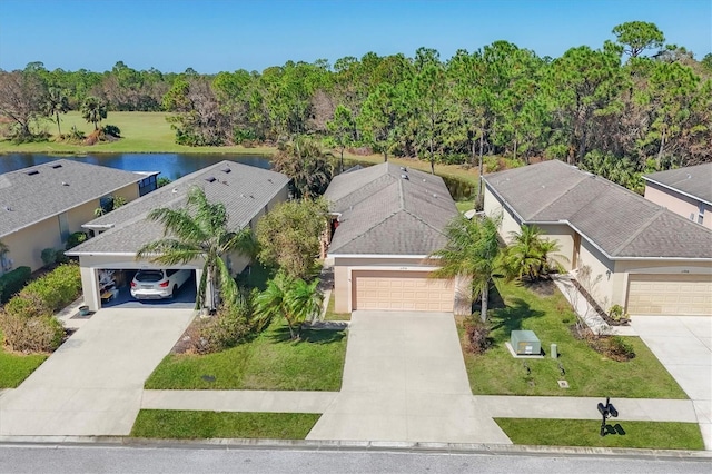 drone / aerial view featuring a water view