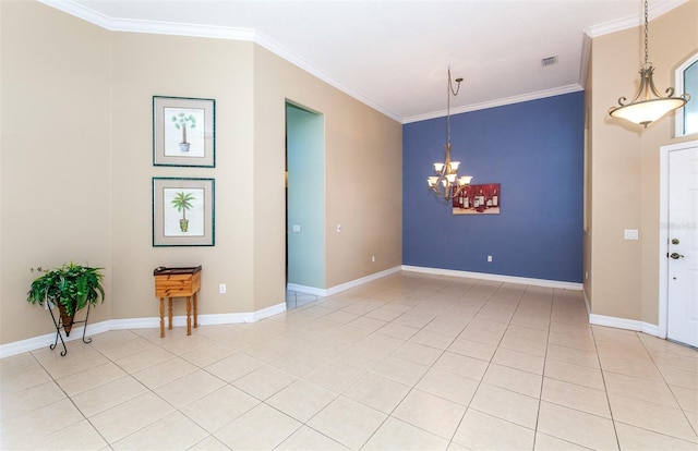 spare room with ornamental molding, tile patterned flooring, and a chandelier