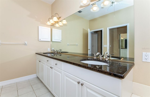 bathroom featuring vanity and tile patterned flooring