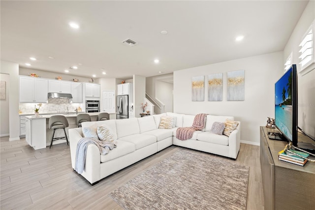 living room featuring light hardwood / wood-style floors