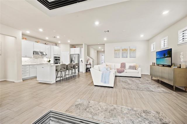 living room with light wood-type flooring